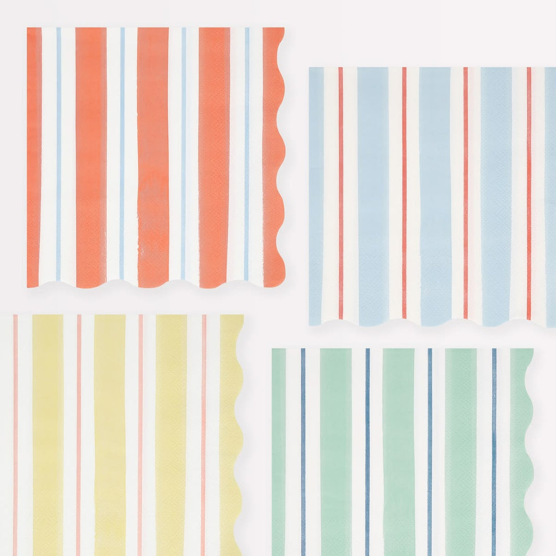 Four rectangular paper napkins with wavy scalloped edges, arranged in a 2x2 grid. Each napkin features vertical stripes in pastel and bright colors including coral, light blue, pale yellow, and mint green on a white background.