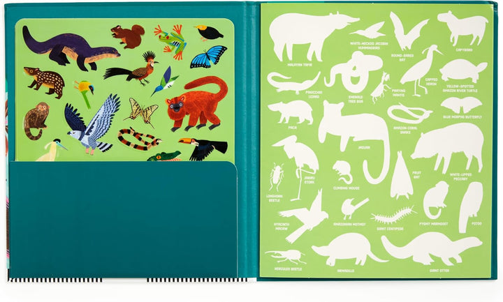 Open book showing illustrations of animals on a green background
