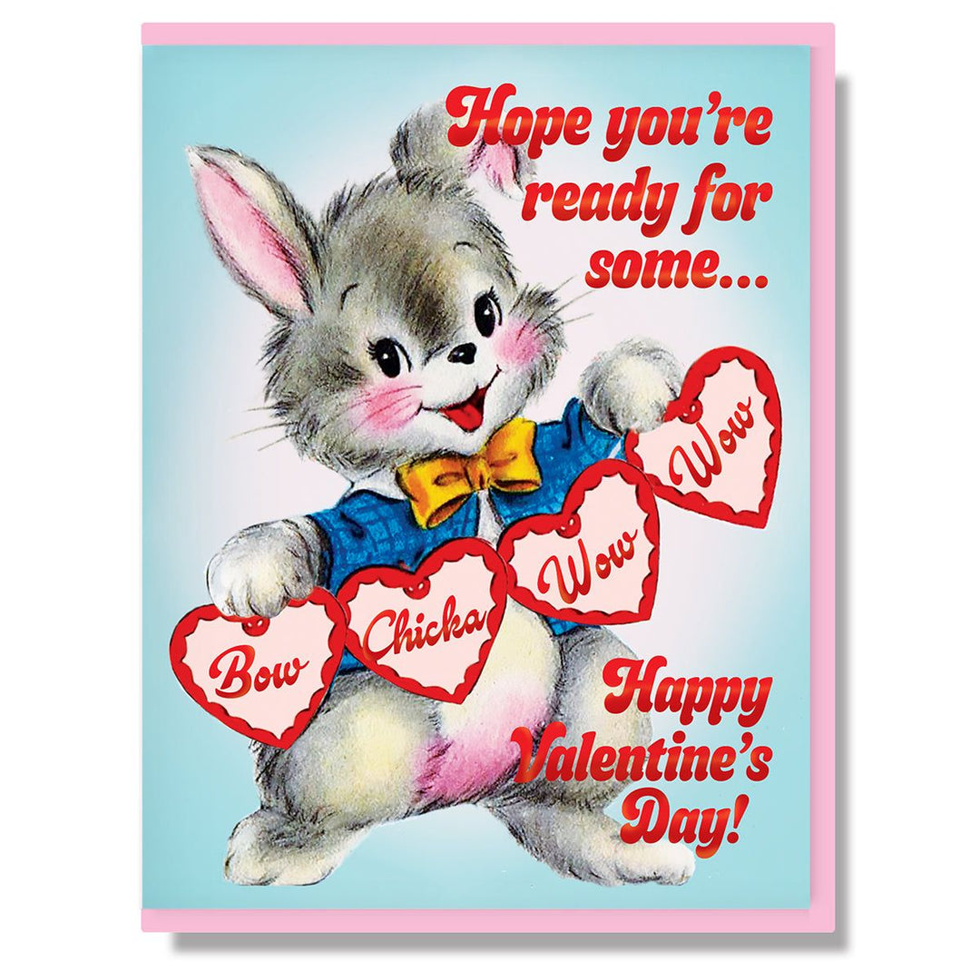Vintage-style Valentine's Day card with a cartoon rabbit holding heart-shaped signs.