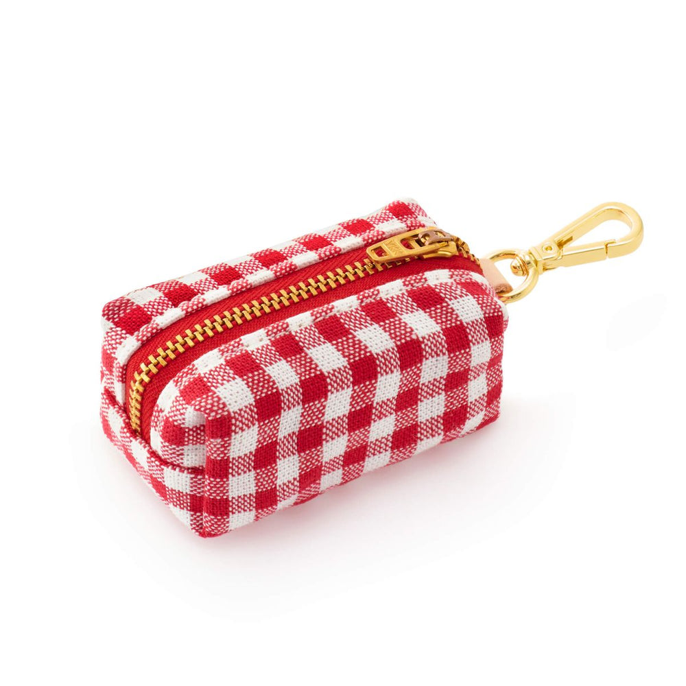 Red and white checkered pouch with gold zipper and clasp on a white background