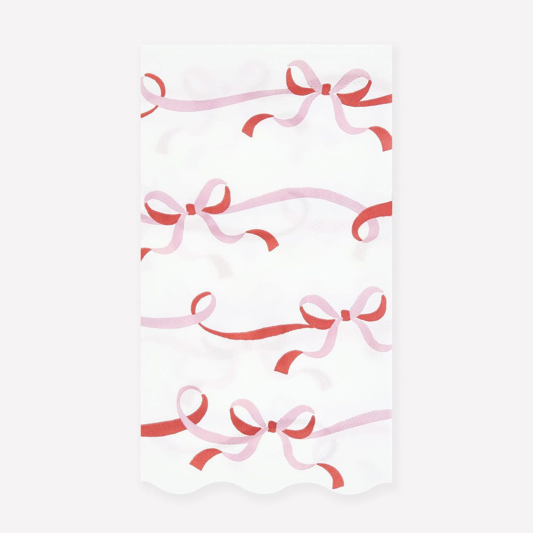Pattern of pink and red ribbons on a white background