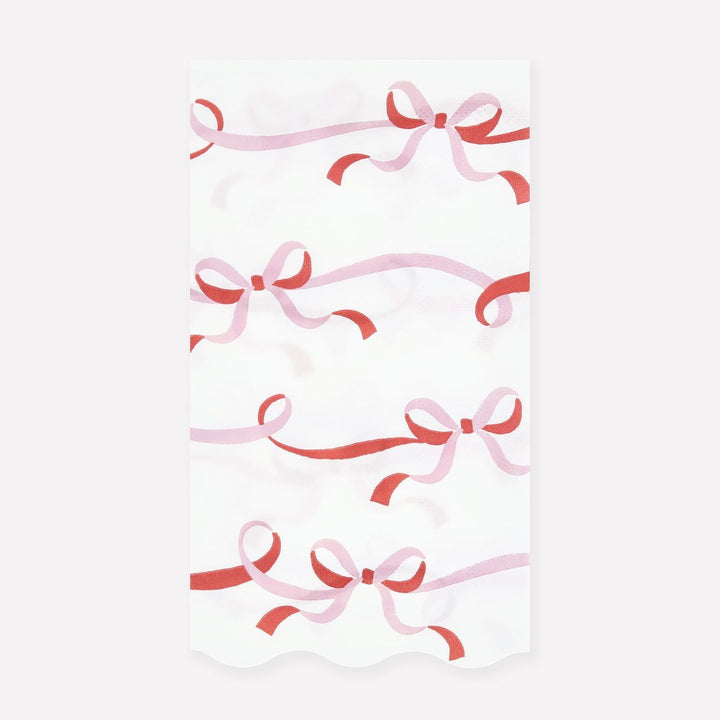 Pattern of pink and red ribbons on a white background