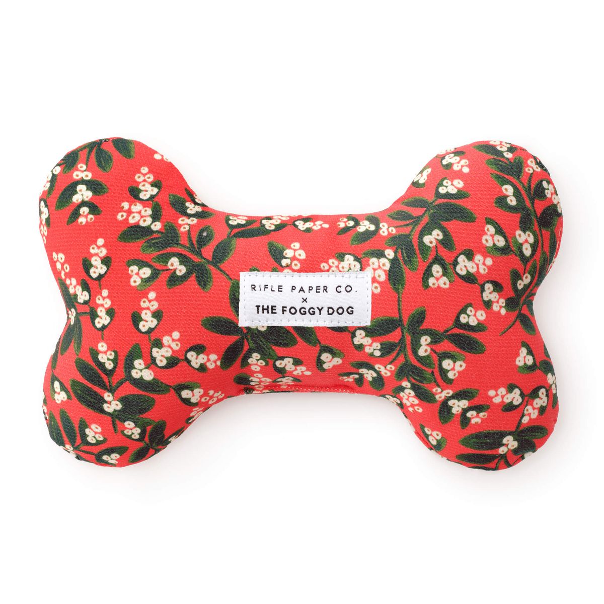 Dog bone-shaped toy with floral pattern and 'The Foggy Dog' label on a white background