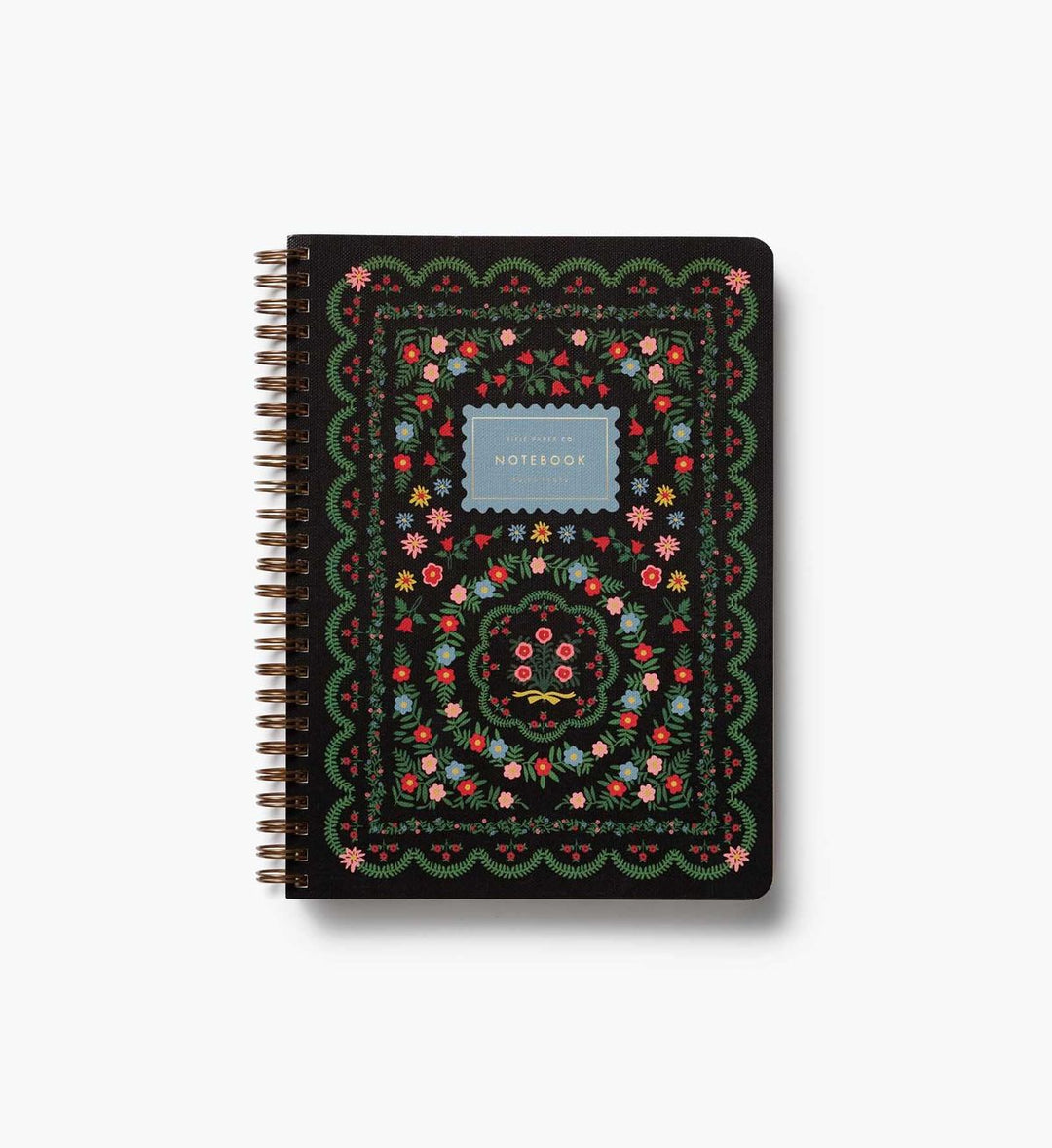 Notebook with floral design on a white background