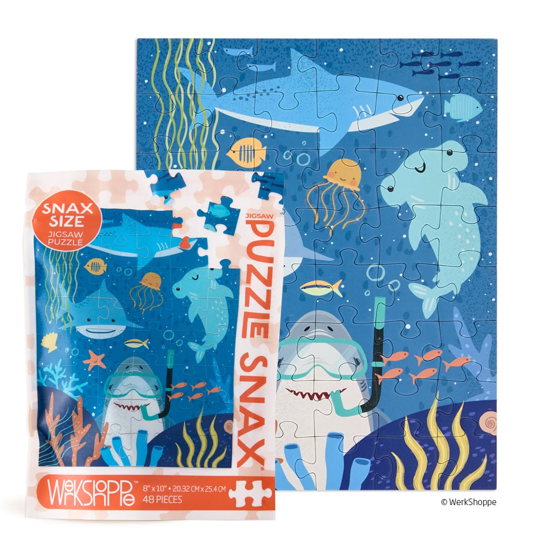 Shark-themed puzzle with packaging on a white background