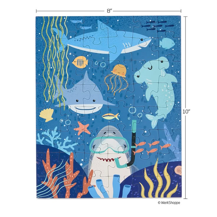 Children's puzzle with shark design and underwater elements, featuring dimensions.