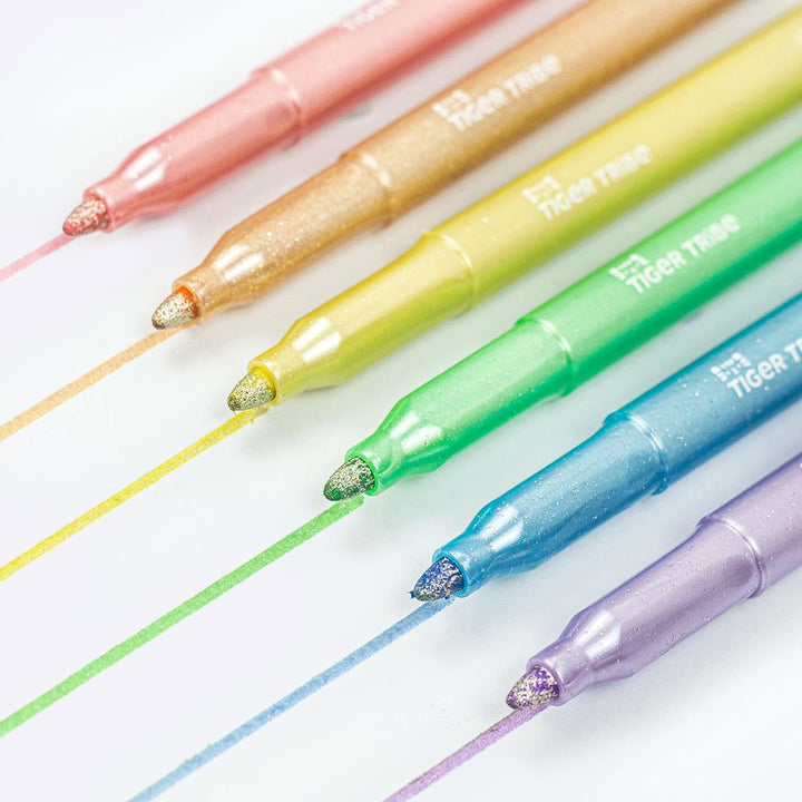 Set of colorful highlighters with visible brand name on a lined paper background