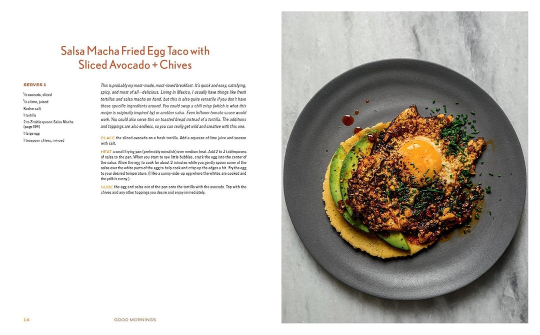 Fried egg taco with sliced avocado and chives on a gray plate, with text on the left side.