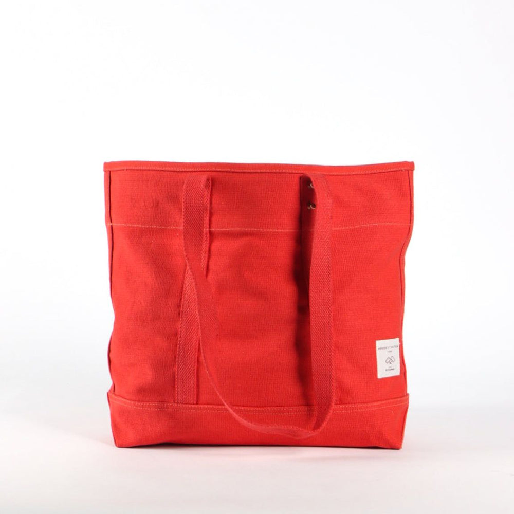 Red tote bag on a white background