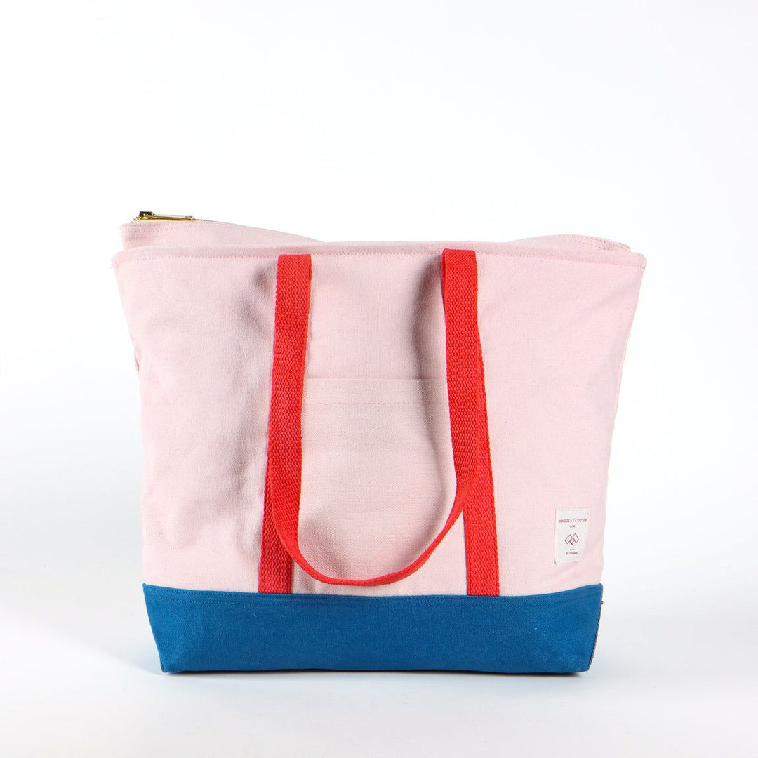 Tote bag with red handles and blue bottom section on a white background