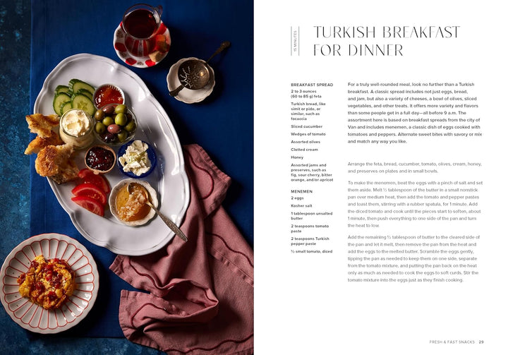 Turkish breakfast spread with plates of food on a blue tablecloth, accompanied by text on the right.