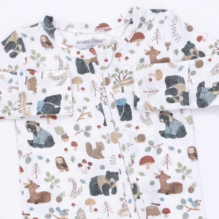 Baby blanket with forest animal pattern featuring bears, deer, and squirrels on a white background.
