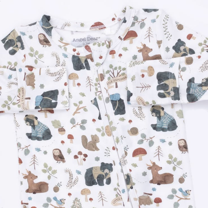 Baby blanket with forest animal pattern featuring bears, deer, and squirrels on a white background.