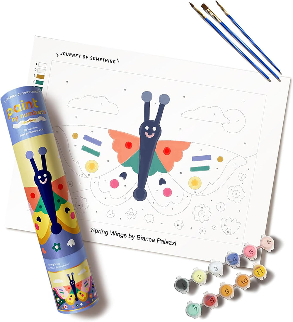 A children's art activity set featuring a printed butterfly coloring page, a branded paint tube, several small paint pots, and three paintbrushes arranged on a white background.
