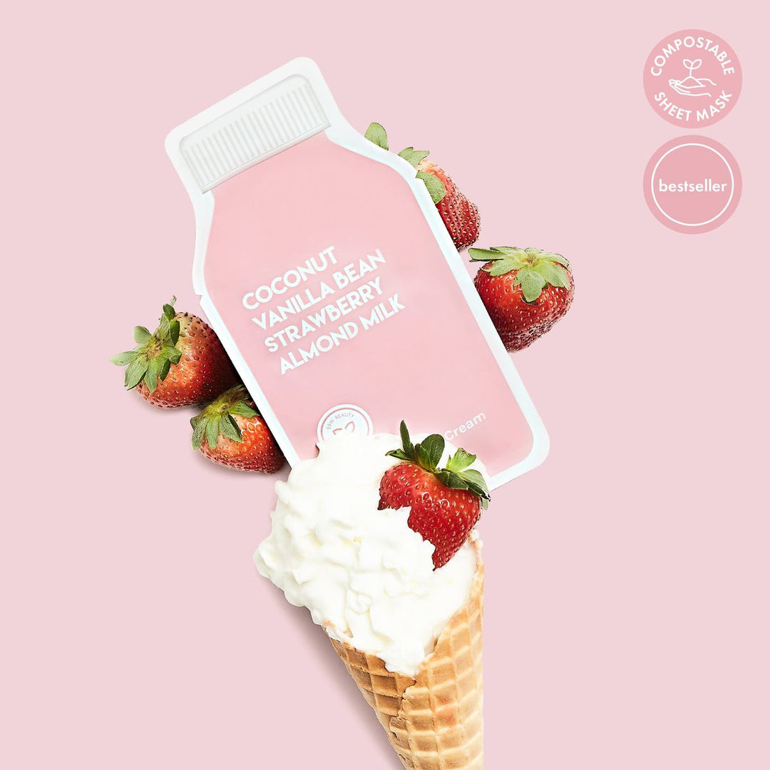Ice cream cone with strawberries and a pink label on a pink background