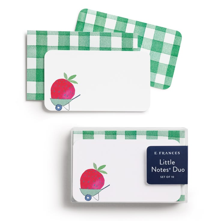 Set of 'Little Notes Duo' with green checkered design and strawberry illustration on white background