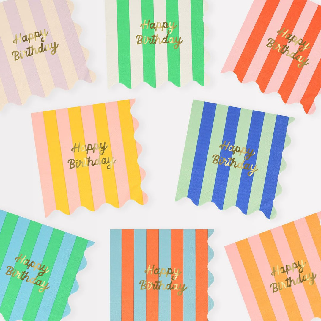 Set of colorful striped cards with 'Happy Birthday' text on a white background