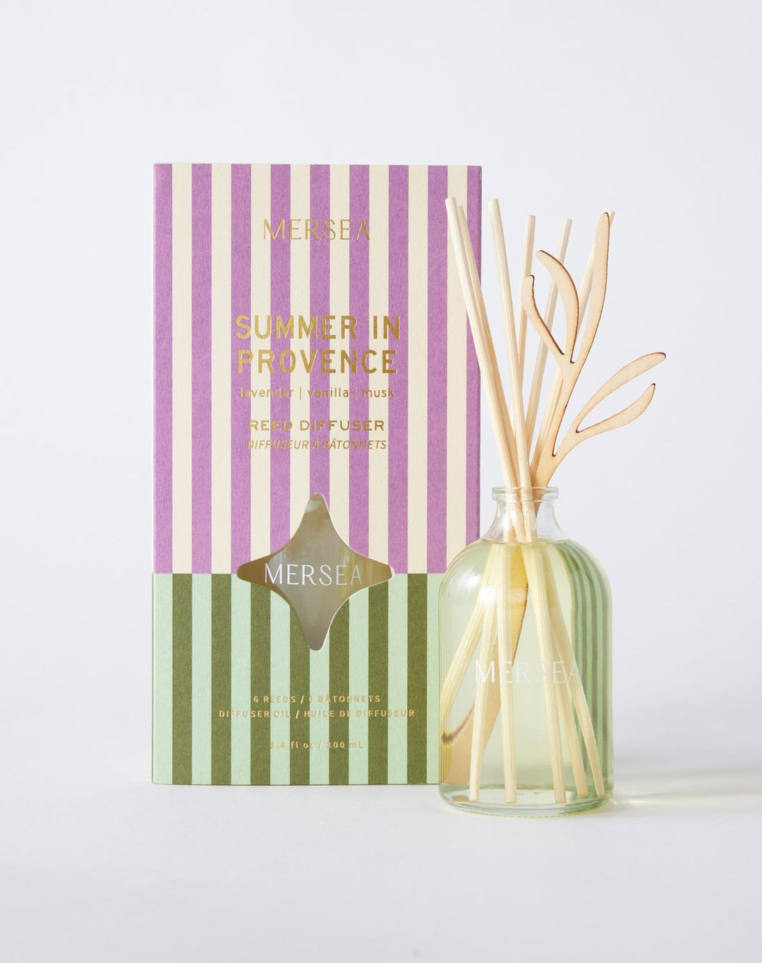 Mersea diffuser set with striped packaging and glass bottle on a white background