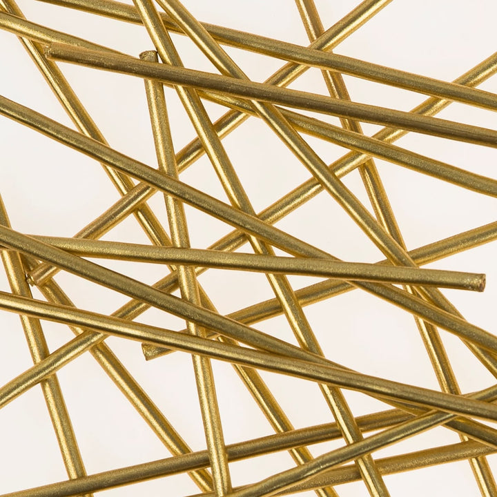 Close-up of gold metal rods on a white background