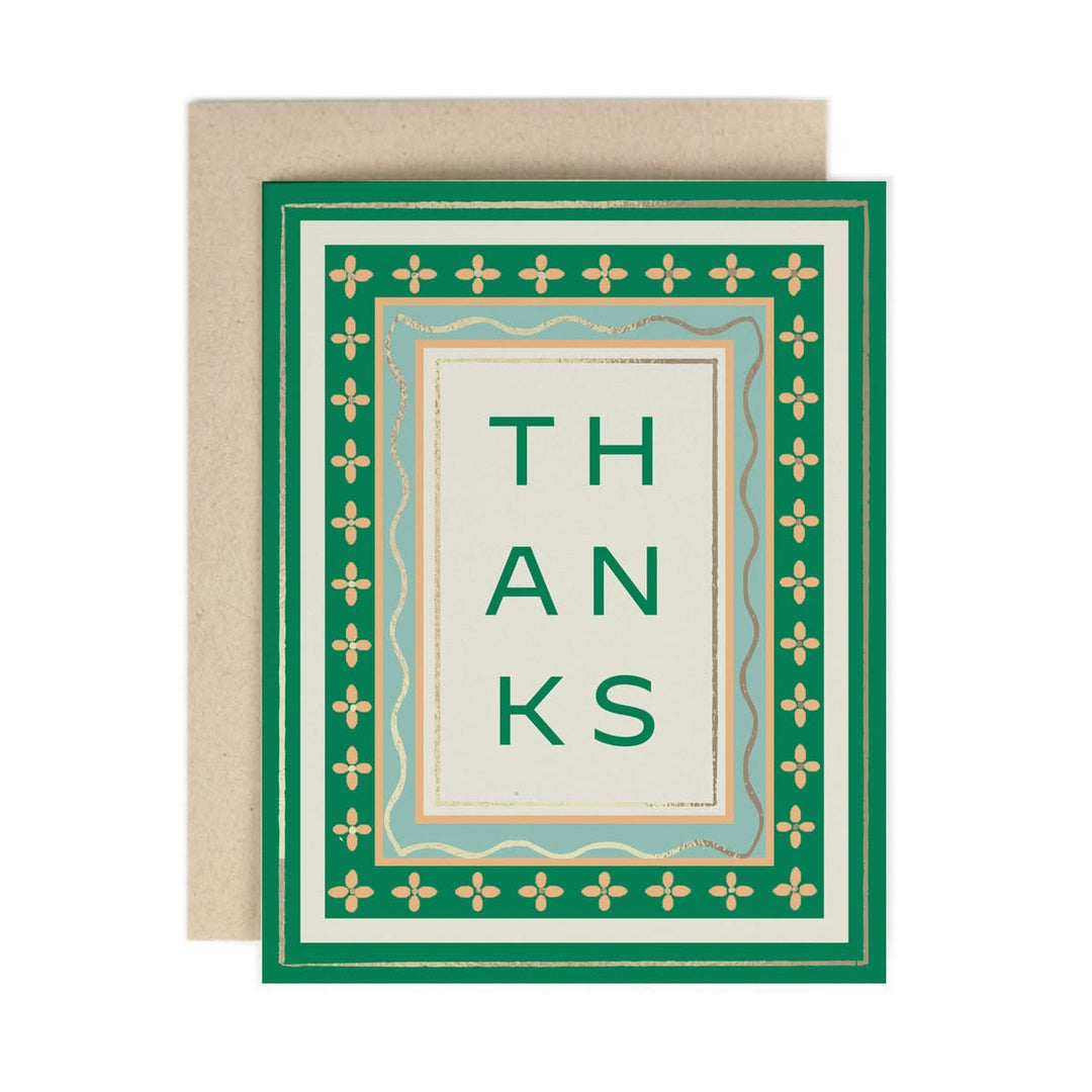 Greeting card with 'THANKS' text and decorative border on a white background