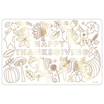 Decorative Thanksgiving placemat with gold foil designs on a white background