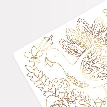 Gold line art of a turkey on a white background