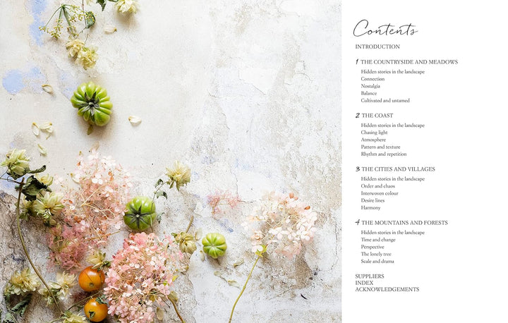 A book cover or printed publication spread with a table of contents on the right side and decorative floral and fruit illustrations on the left, set against a textured off-white background.
