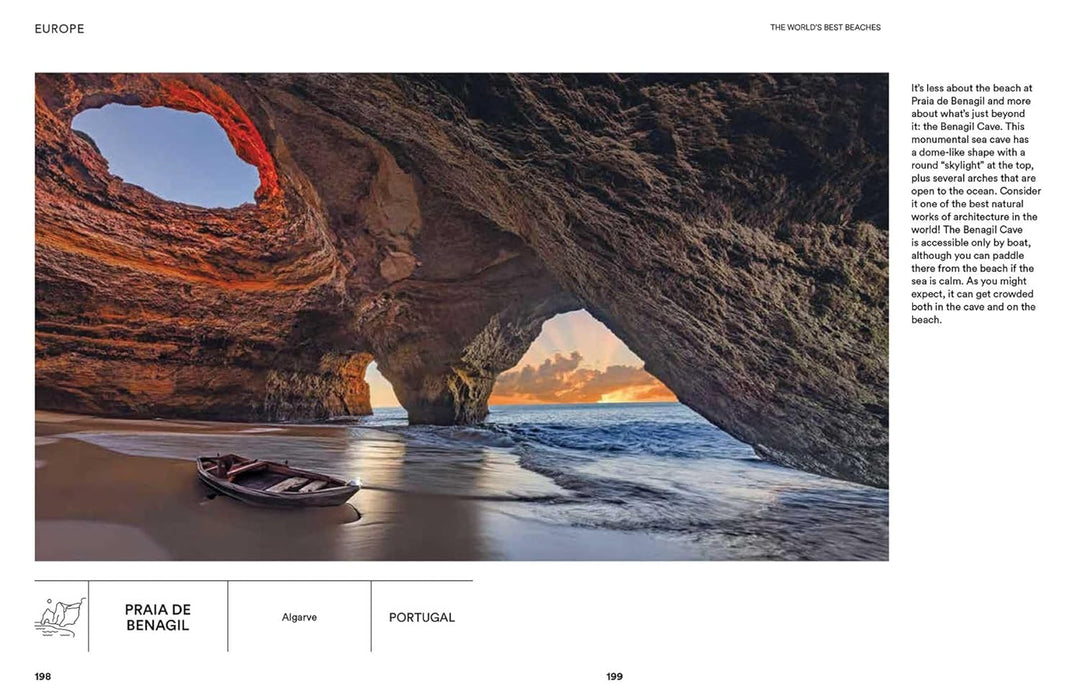 Cave entrance with a boat on a beach at Praia de Benagil, Portugal