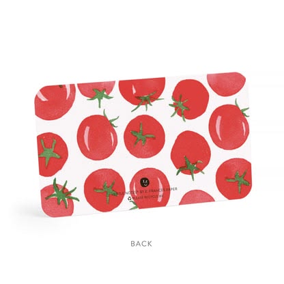Product packaging with tomato pattern on a white background