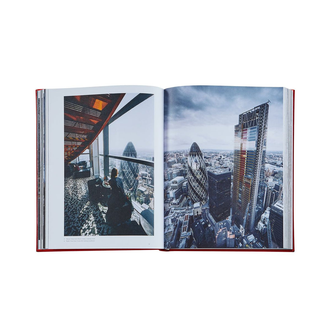 Open book showing a cityscape with modern buildings