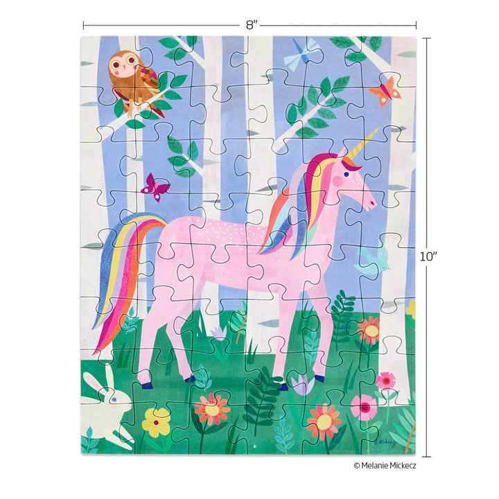 Children's puzzle with a unicorn, rabbit, and butterfly in a forest design.
