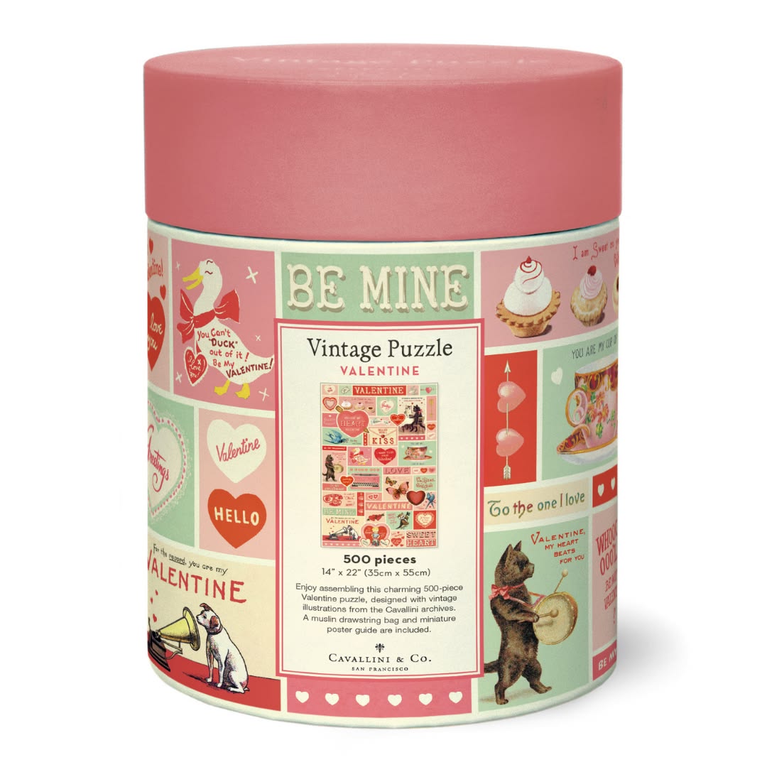  cylindrical puzzle box with vintage Valentine's Day design on a white background