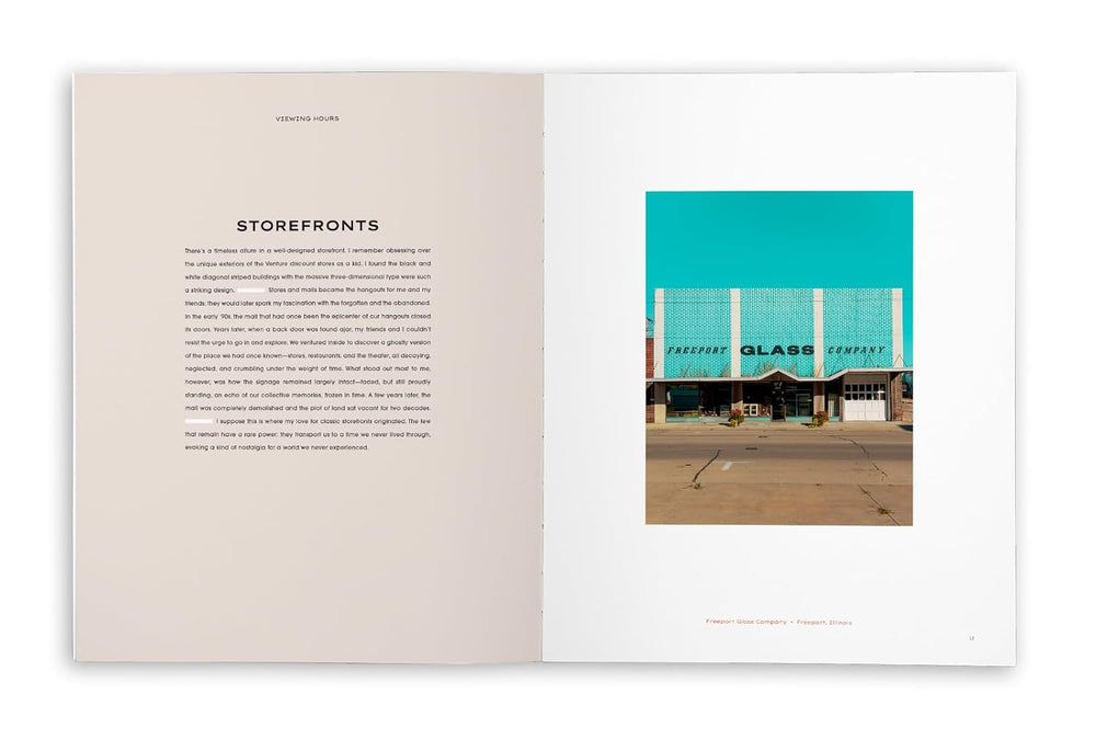 Open book with text on one page and a photograph of a storefront on the other, featuring a teal sign.