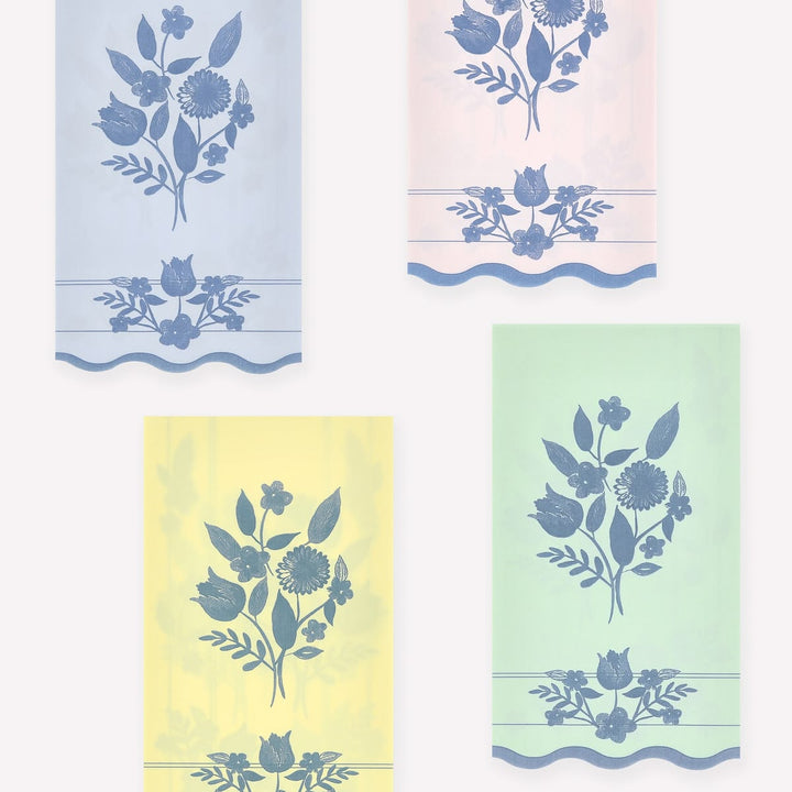 Set of four fabric swatches with floral patterns on a white background