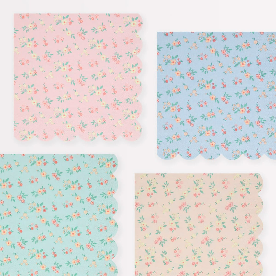Four floral patterned paper sheets in pink, blue, and beige.