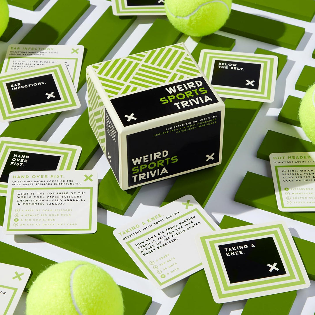 Box of 'Weird Sports Trivia' game cards with tennis balls on a green and white patterned background.